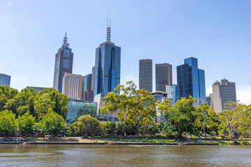 City view of downtown Melbourne with modern architecture and the Yarra river.