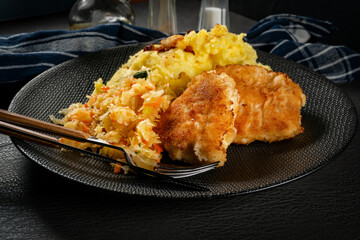 Fried cod fillet served.