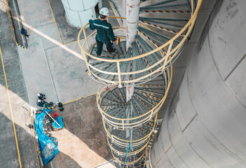 Male walking down the stairway tank