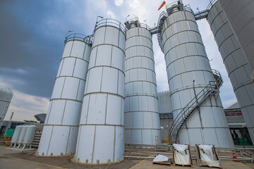 Barrels silo stock chemical products The metal barrels are white.Manufacture of chemicals