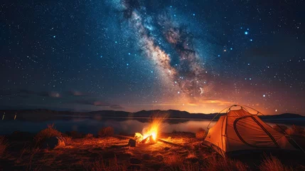 Tuinposter Camping under the Stars: A cozy campsite under a starry night sky, with a crackling campfire and silhouetted tents, conveying the joy of outdoor camping © Nico
