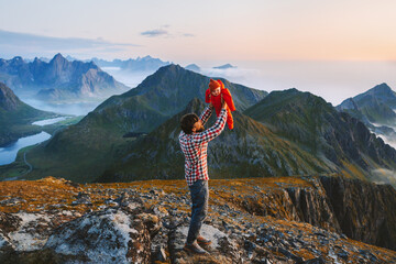 Father with baby hiking in mountains outdoor family travel active healthy lifestyle dad and child exploring Norway summer vacations Lofoten islands landscape, Fathers day holiday - 749356219