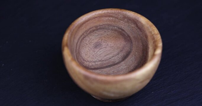 empty wooden plate on the table, carved from wood empty wooden plate for groceries