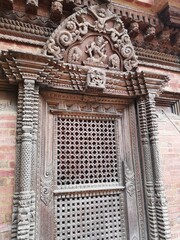 The intricately carved wooden window at Darbar square at Patan, Nepal