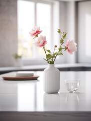 white empty table in the foreground, next to a vase of flowers, against the background of a blurred stylish modern kitchen сreated with Generative Ai
