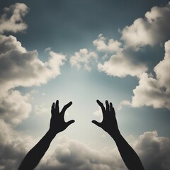 Two hands silhouettes reaching to the sky reaching the clouds 