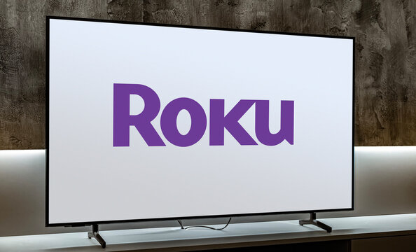 Flat-screen TV set displaying logo of Roku