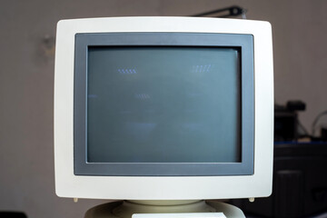 A vintage CRT monitor with blank screen, 4:3 aspect ratio, retro computing cathode ray tube...