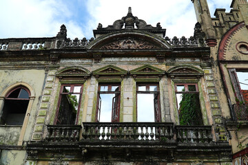 Obraz premium Lost places. View of an abandoned façade, remains of the old Amazonas Court of Auditors. Manaus, Amazonas, Brazil.