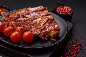 Delicious smoked or grilled ribs with olives, spices and herbs