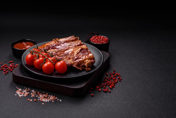Delicious smoked or grilled ribs with olives, spices and herbs