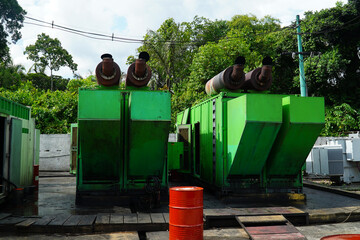 Diesel generator that produces black clouds of smoke to produce electricity for the population in...