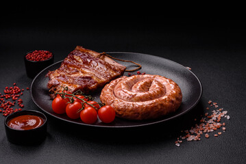 Delicious grilled sausage in the form of a ring with salt, spices and herbs