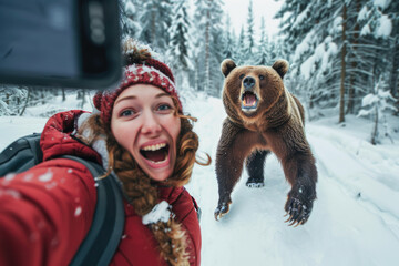 woman tourist take selfie while running out from angry bear in snow forest - obrazy, fototapety, plakaty