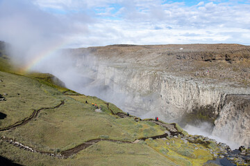 High angle view of Dettifoss waterfall in Iceland, fed by glacier river Jökulsá á Fjöllum which flows from the Vatnajökull glacier into Jökulsárgljúfur canyon, part of Vatnajökull National Park