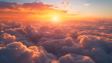 breathtaking sunset view from above the clouds. The sun is a bright yellow, casting its warm glow...