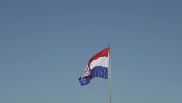 National flag of Paraguay waving in the wind at Cerro Cora national park.