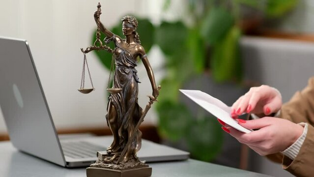 A woman lawyer receives money in an envelope. The concept of payment for legal services, corruption in the contracting industry and bribery.