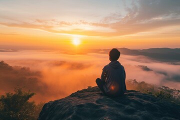 Tranquil beauty: individual meditating on rock with misty landscape