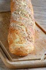 Baked wheat bread with herb seasoning seasoned baguette