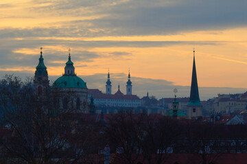 Prague rooftop cityscape view at sunset.