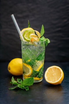 Refreshing lemon and mint lemonade in transparent glass