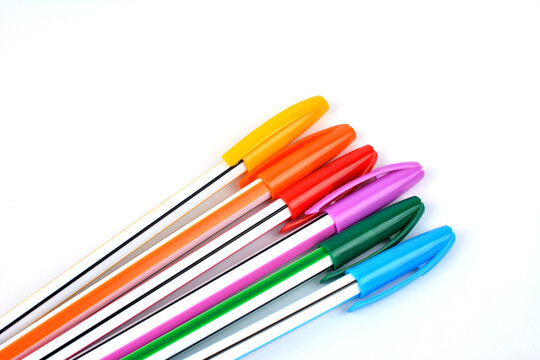 Colorful pens isolated on white.