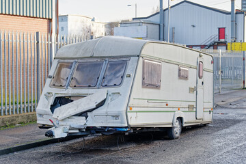 Caravan abandoned and dumped in street waiting to be removed