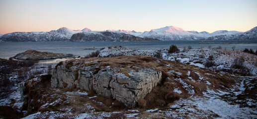 Mountain range peaks lit by winter sun,, northern Norway