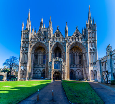 A view towards the front of the cathedral in Peterborough, UK on a bright sunny day