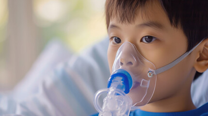 Asian Boy in Pediatric Care Using Nebulizer Mask for Respiratory Therapy

