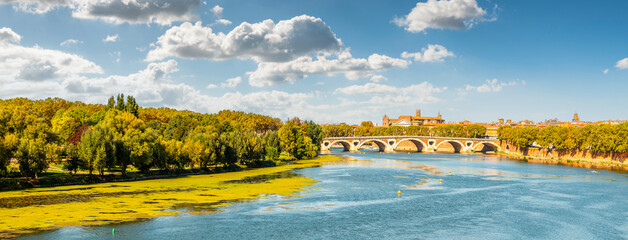 Panoramic view of the Garonne and Pont Neuf in Toulouse, in Haute Garonne, in Occitanie, France - 749489048