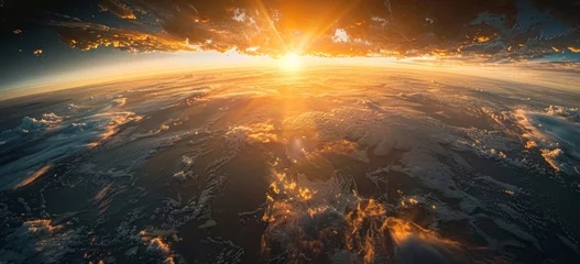 Fototapeten sunrise over the earth © paul