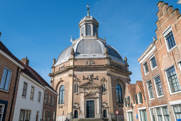 Fototapeta na wymiar Street to the Oostkerk octagonal domed church in Middelburg Netherlands