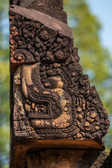 Bas-relief of Banteay Srei, the temple known for its beautiful carvings on red sandstone in Siem Reap, Cambodia. - 749499238