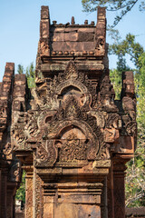 Bas-relief of Banteay Srei, the temple known for its beautiful carvings on red sandstone in Siem Reap, Cambodia. - 749499417