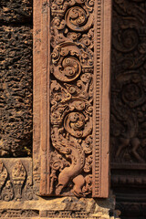 Bas-relief of Banteay Srei, the temple known for its beautiful carvings on red sandstone in Siem Reap, Cambodia. - 749499426