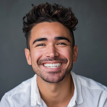 Studio portrait of a man smiling. Advertisement for dental, business, studio, etc.
