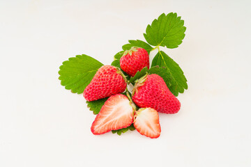 Fresh strawberries on monochrome background