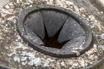 thrown in front of a glass container with glass splinters