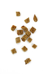 Tiny bread cubes isolated on white background. 