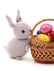 Toy rabbit with Easter eggs.