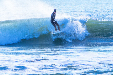 Surfer enjoying the waves at Bournemouth Beach