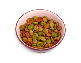 dry dog or cat food in a bowl isolated on white.