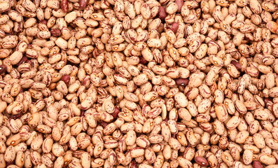Top view full frame background of healthy dried uncooked bean seeds. Vegetarian and nutrition concept
