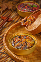 Special Chinese fast food minced pork and eggplant on simple background