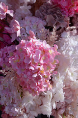 bouquet of pink and white artificial flowers close up