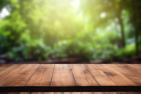 The empty wooden table top with a blurred background