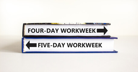 5 or 4 day week symbol. Concept word Five-day workweek or Four-day workweek on beautiful books. Beautiful white table white background. Business and 5 or 4 day week concept. Copy space.