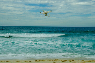 Drone flying above sea